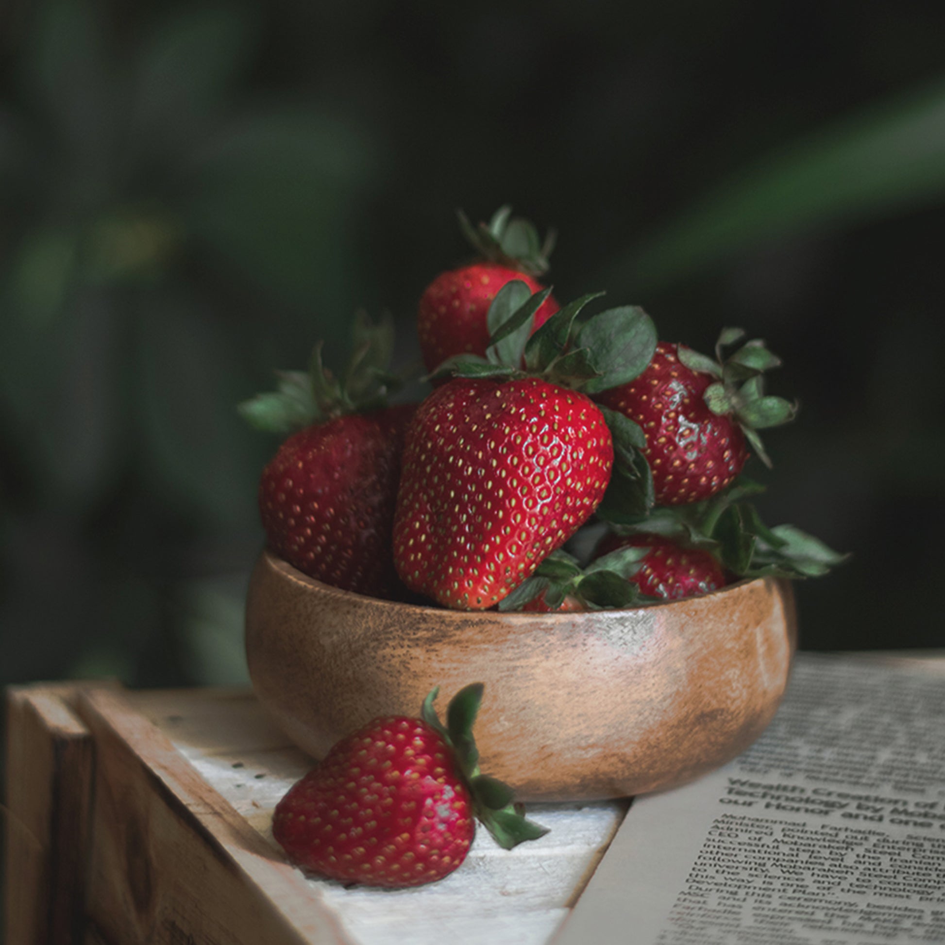 a bowl with fresh strawberries